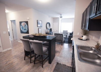 Kitchen and living room at The Villages at Fiskville retirement community